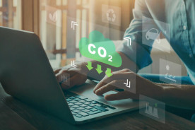 How much carbon is emitted for manufacturing a new laptop?